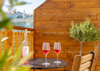 Glasses of red wine on table